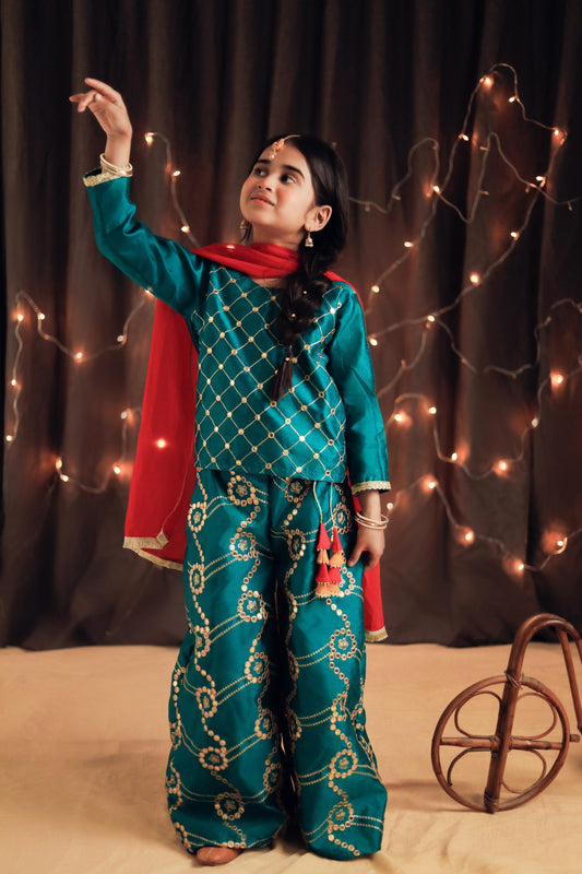 Teal colored plazo and short shirt with golden embroidery and pink contrast dupatta